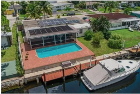 Beautiful Canal Front Home w Pool & BBQ